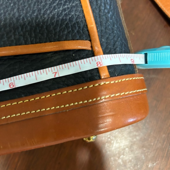 Dooney & Bourke Black and Tan Crossbody Bag with Signature Brass Lock - Picture 12 of 14